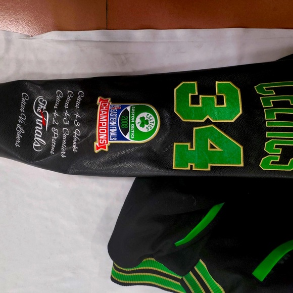 Show your love for the Boston Celtics with this black, green, and gold varsity. - Picture 5 of 6